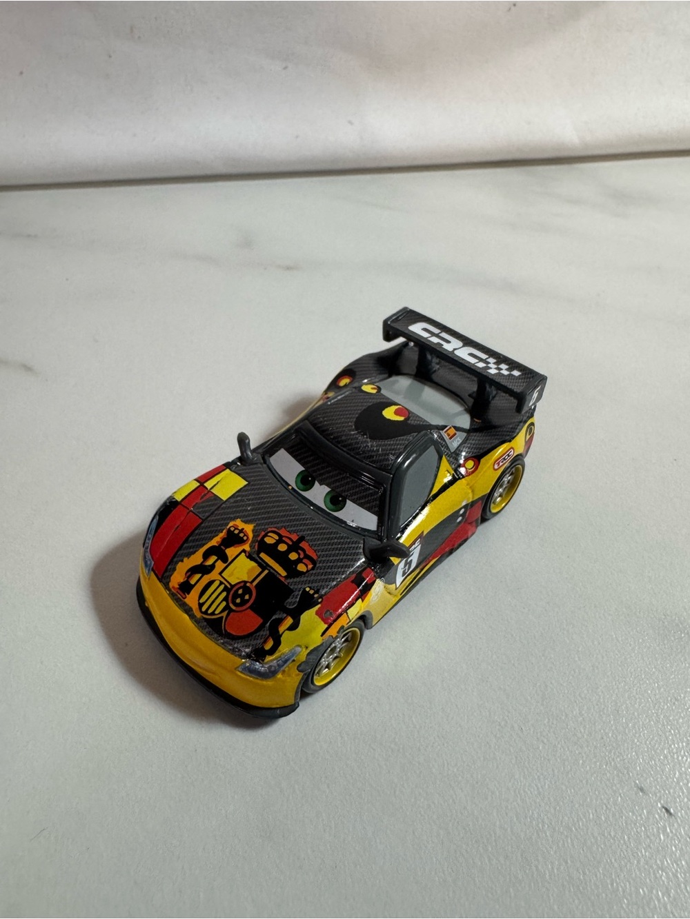 Disney Pixar Cars Miguel Camino Carbon Racers Spain CRC Mattel Diecast 1:55